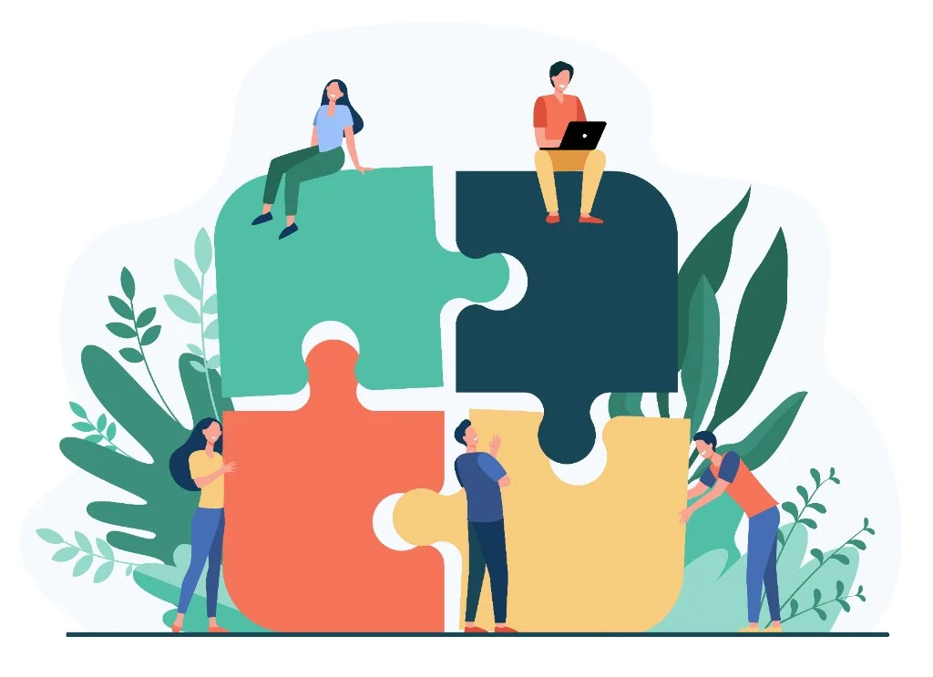 Team collaborating to build a puzzle together